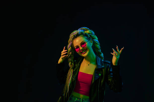 istock young woman with dreadlocks in red sunglasses dancing 1339629566