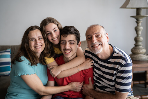 Portrait of a family at home