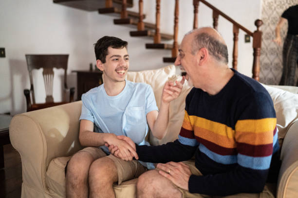 istock Father and son playing with each other at home 1339635234