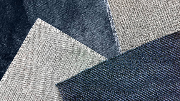 istock close up combination of fabric samples background in blue and grey tone. multi pattern of fabric. interior material concept background (focused on blue linen fabric). 1339638328