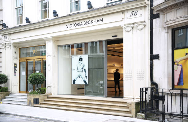 Victoria Beckham's Dover Street store in London London / UK - 09/04/2021: Victoria Beckham's London boutique shot at eye-level with the door open victoria beckham stock pictures, royalty-free photos & images