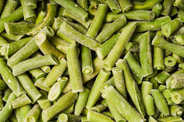 istock Chopped green bean pods, covered with ice 1339639031