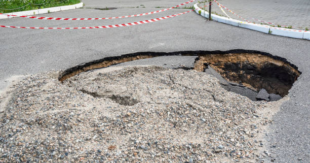 istock Road is damaged requires repair and maintenance. 1339641600