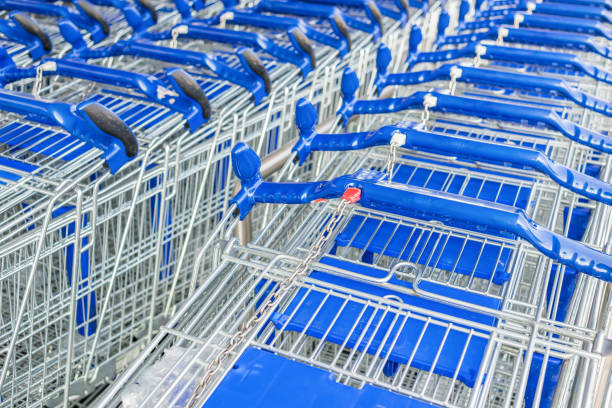 istock A Line Of Shopping Carts nested together. 1339643075