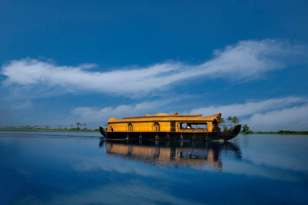 House boat under blue sky from Alleppey or Alappuzha Kerala.Kerala Backwaters, houseboat Photo
