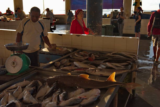 Sandakan. Malaysia. November 26, 2018. In the early morning, sellers at the fish market sell seafood brought from the sea at night at dawn.