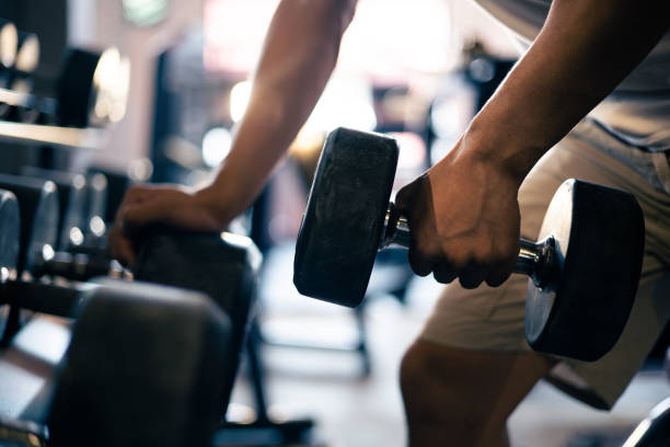 istock Pump that iron in a gym 1339650112