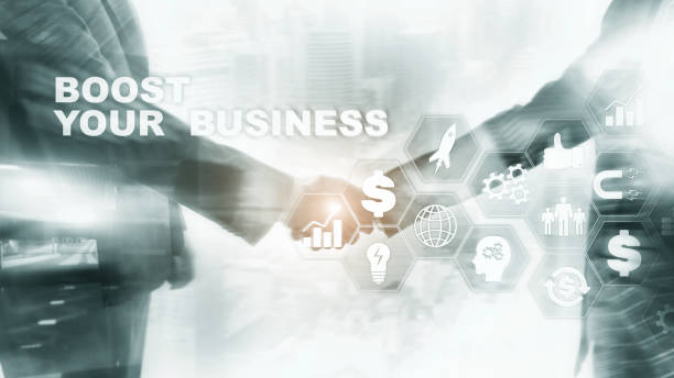 istock Financial and Technology concept. On a virtual screen inscription: Boost Your Business 1339655125