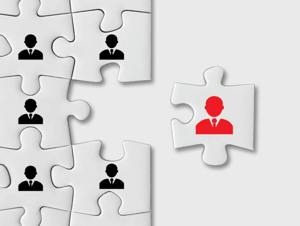 istock Human resources and management concept, puzzle pieces with business people icon on white background 1339656730