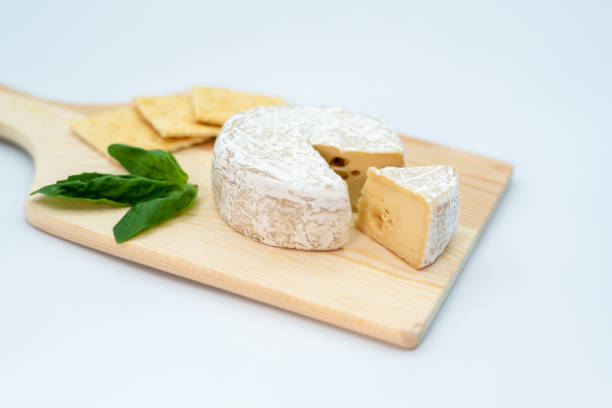 istock Camembert cheese photo taken in a studio on a white background 1339658603