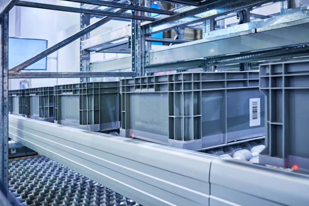 istock Plastic Crates at Conveyor Belt 1339660789