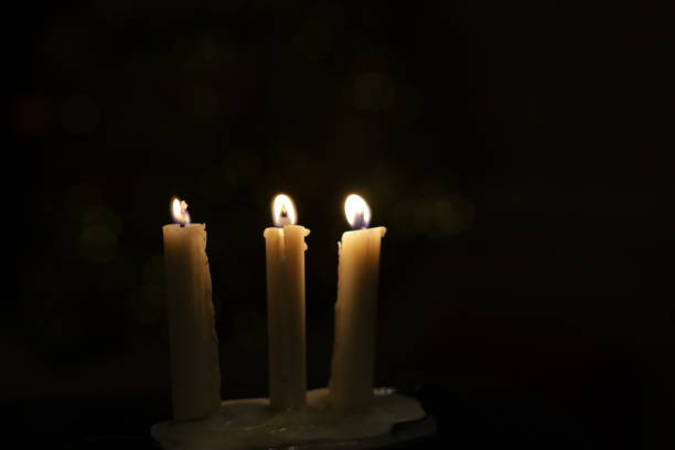istock Defocused - Candlelight in the dark 1339663838