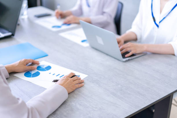 istock Business person working in clean office 1339665703