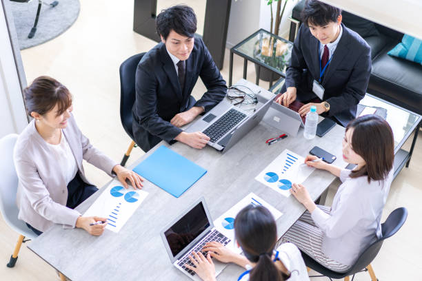istock Business person working in clean office 1339665737