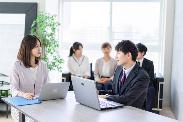 istock Young office worker having an business meeting 1339667045