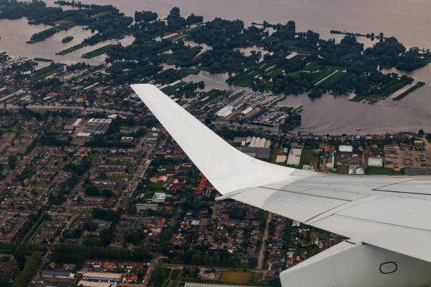 istock Plain wing over Holland. Flight from Amsterdam to Brussels. 1339669178