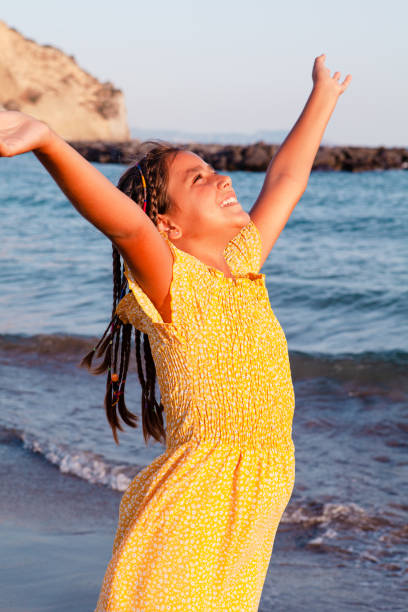 istock Happy Girl at Sea 1339671528