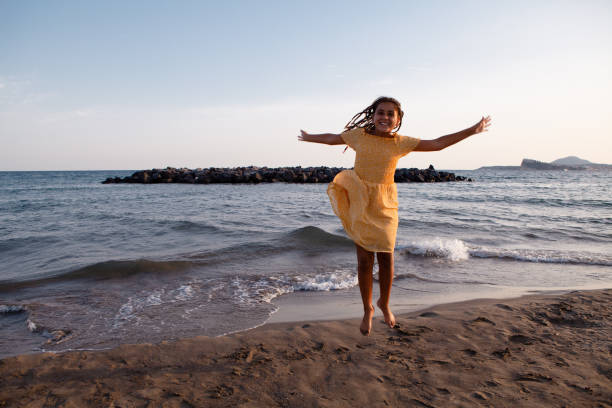 istock Happy Girl at Sea 1339671555