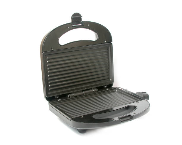 istock domestic sandwich maker isolated on the white 1339671949