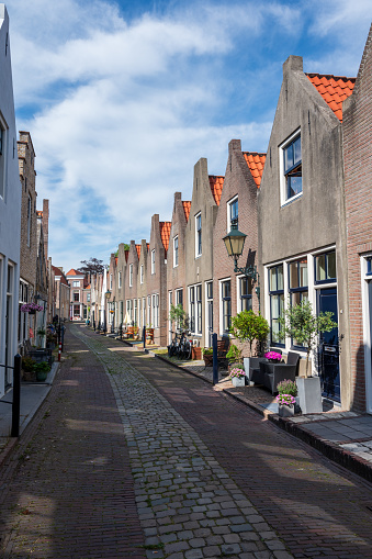 Walking in old Dutch town Zierikzee with old small houses and streets, Zeeland, Netherlands