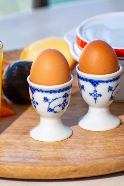 istock Continental breakfast with soft-boiled chicken egg served outdoor 1339674331