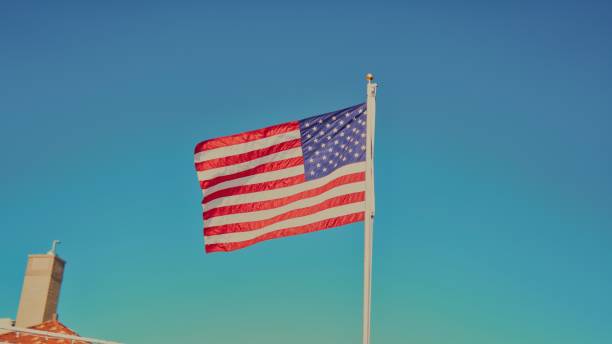 US flag standing tall and proud