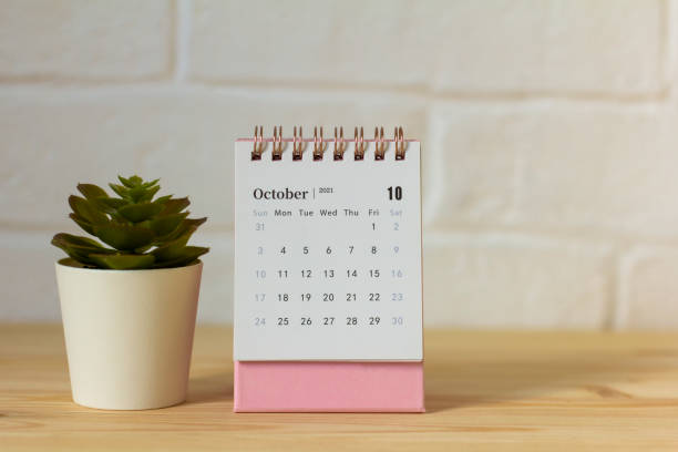 istock Calendar with tear-off sheets for October 2021. A desktop calendar for planning, organizing and managing each date. 1339676733