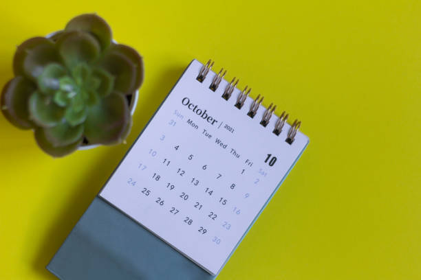istock Calendar with tear-off sheets for October 2021. A desktop calendar for planning, organizing and managing each date. 1339676820