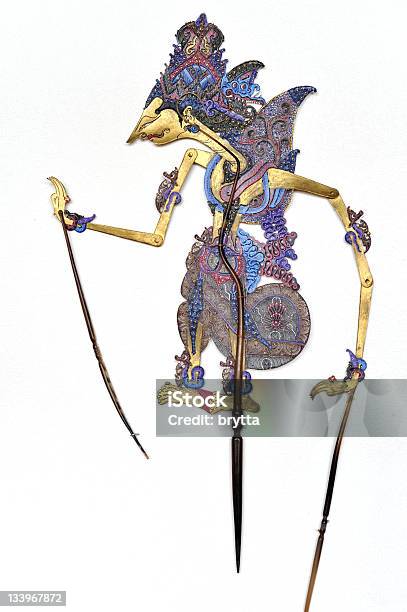 Indonesian Traditional Wayang Kulit Puppet Hanging On White Wall Stock Photo - Download Image Now