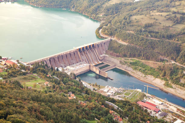 istock Dam power plant, lake on river 1339679595