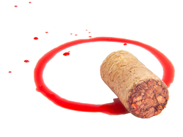 istock Wine cork and dirty red circle isolated on the white 1339679703