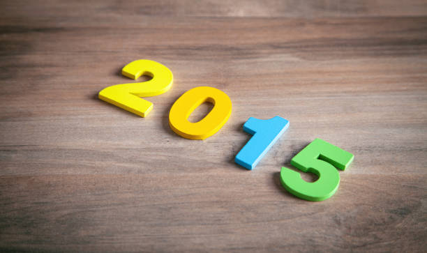 istock Happy New Year. 2015 on wooden background 1339686669