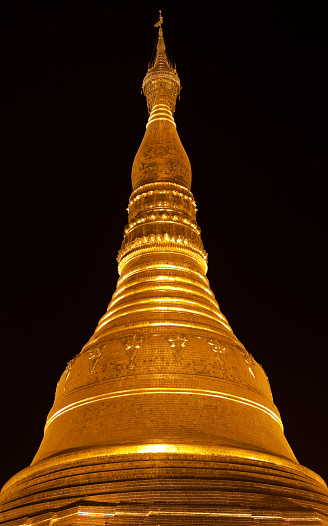 The Shwedagon Pagoda, also known as the Golden Pagoda, is a 98-metre gilded stupa located in Yangon, Burma. It is the most sacred Buddhist pagoda for the Burmese with relics of the past four Buddhas enshrined within.