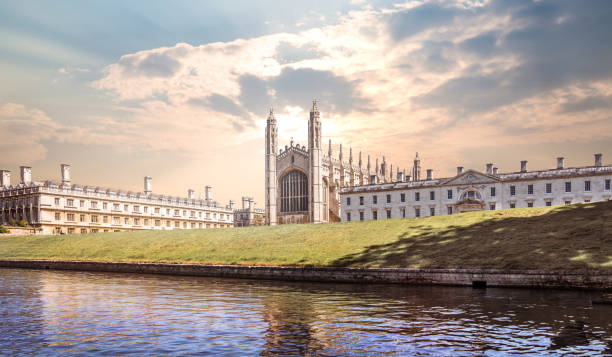 Cambridge, beautiful sunset. King's college chapel and river Cam at sunset. Cambridge University buildings stock photo
