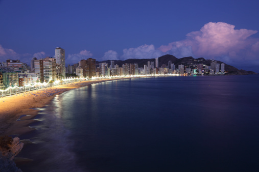Highrise buildings along the beach of Benidorm at night, Spain