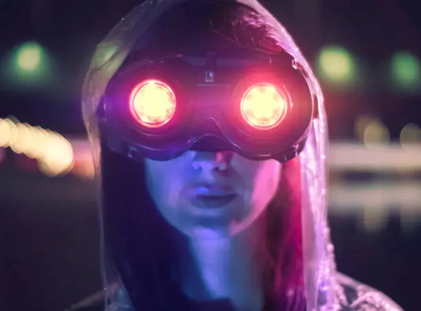 Sci-fi Cyborg girl at futuristic city with colorful light