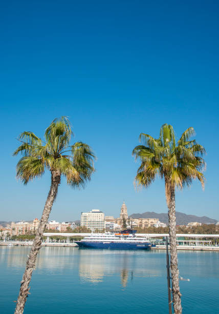 Malaga, Spain - January 3, 2024:  A beautiful view of Playa de Bil Bil in Benalmadena, Malaga of Spain's Costa del Sol during golden sunset hour.  HDR encoded.