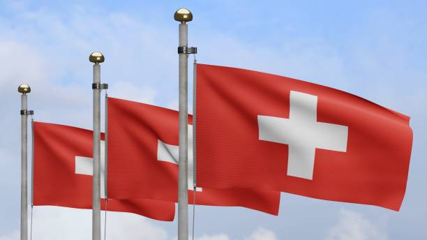 istock 3D, Switzerland flag waving on wind with blue sky and clouds. 1339711122