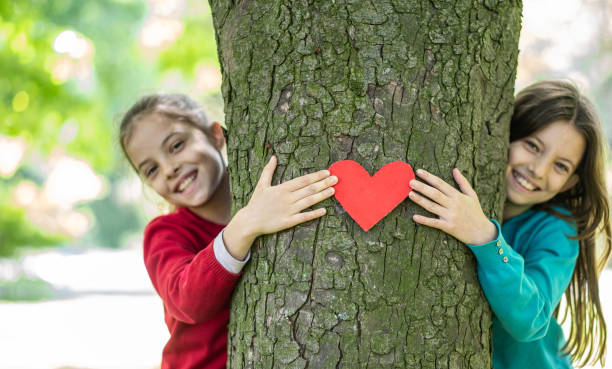 istock Girls love the tree 1339718381