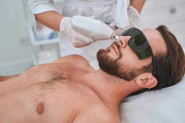 istock Young spa client in safety goggles during a cosmetic procedure 1339725417