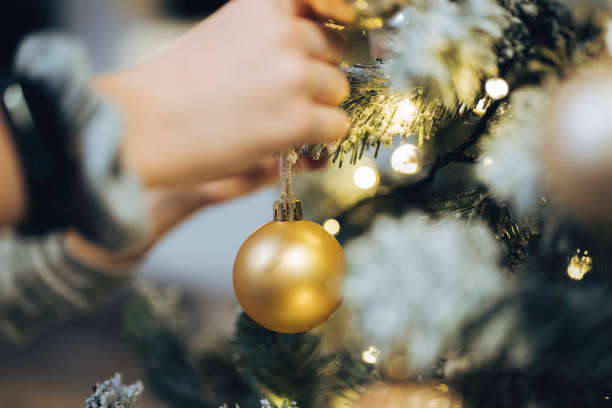 istock Gold bauble on the Christmas tree 1339726221
