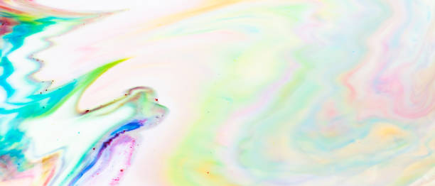 istock Multicolored lines and spots on liquid surface. Abstract background made with fluid art technique. Trendy colorful backdrop. Fluid art 1339727032