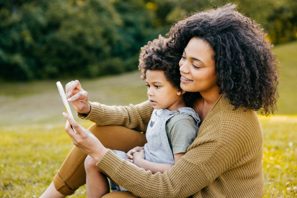 istock Watching movie online with son 1339731980