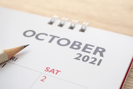 October month on 2021 calendar page with pencil business planning appointment meeting concept
