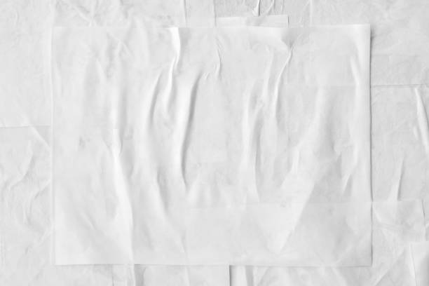 istock white crumpled and creased paper poster texture background 1339739197