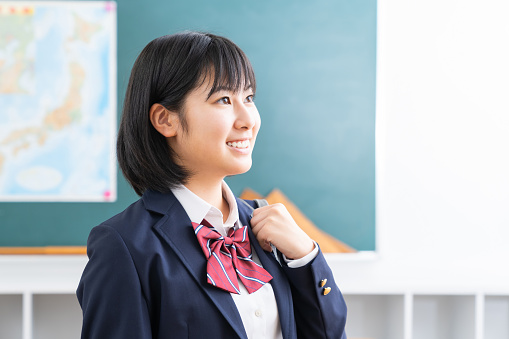 asian girl who study,School uniform,School classroom
