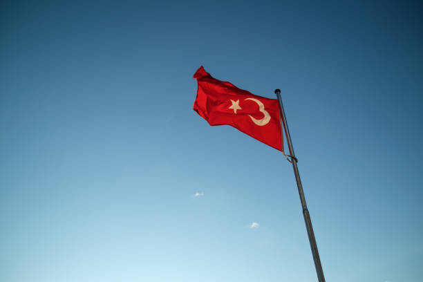 istock A Turkish flag waving in the sky 1339757799