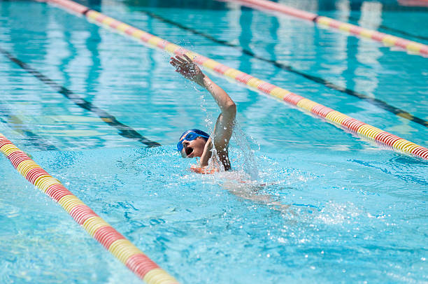 istock Female athlete swimming front crawl 133975862