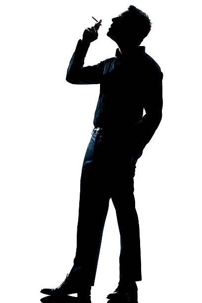 istock silhouette man smoking cigarette full length 133975882