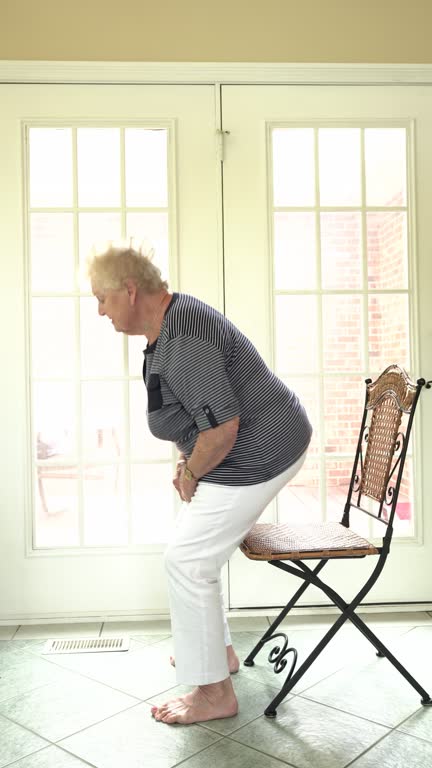 Woman does physical therapy exercises for balance at home